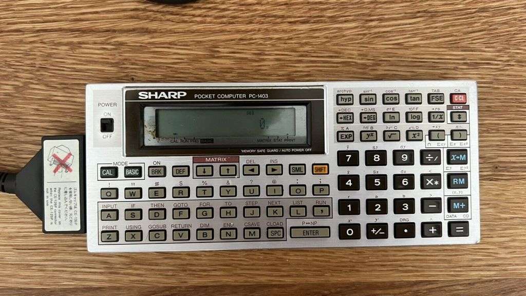 Two vintage Sharp Pocket Computers PC-1401 plus two SHARP Printers CE-126P