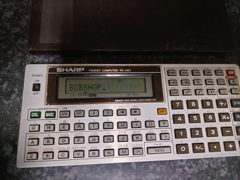 Two vintage Sharp Pocket Computers PC-1401 plus two SHARP Printers CE-126P