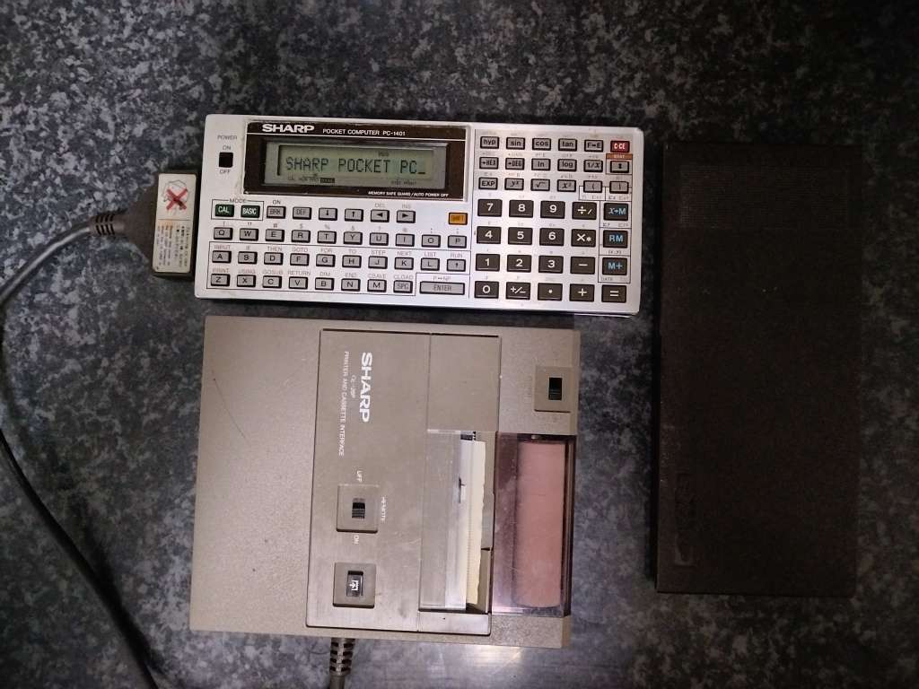 Two vintage Sharp Pocket Computers PC-1401 plus two SHARP Printers CE-126P