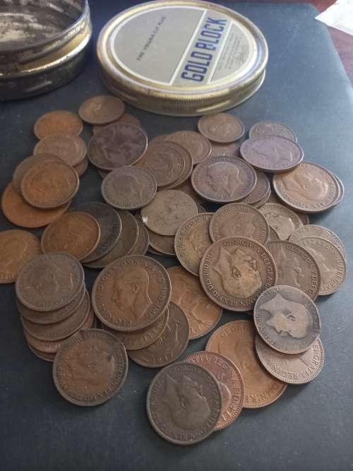 Tin with over 60 Great Britain pennies and half pennies