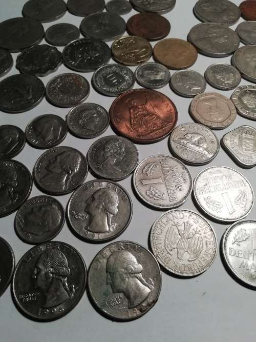 55 Mixed International coins. One bid for the lot