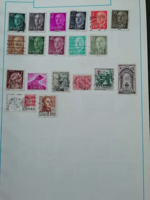 Stamp album, full of hinged stamps.