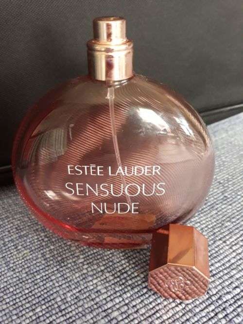 A BEAUTIFUL PINK PERFUME BOTTLE - SENSUOUS NUDE BY ESTÉE LAUDER ,NEW YORK