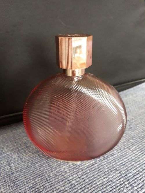 A BEAUTIFUL PINK PERFUME BOTTLE - SENSUOUS NUDE BY ESTÉE LAUDER ,NEW YORK