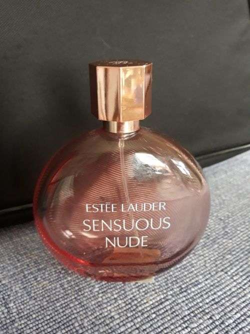 A BEAUTIFUL PINK PERFUME BOTTLE - SENSUOUS NUDE BY ESTÉE LAUDER ,NEW YORK