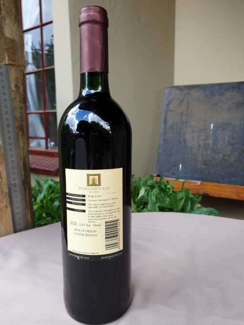 AN OLD BOTTLE OF SIMONSVLEI CABERNET SAUVIGNON - MERLOT