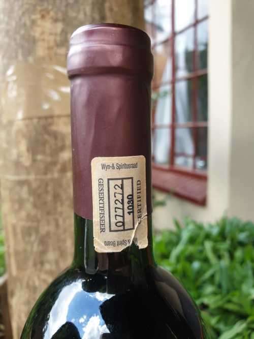 AN OLD BOTTLE OF SIMONSVLEI CABERNET SAUVIGNON - MERLOT