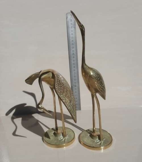 ENDEARING VINTAGE PAIR OF BRASS COURTING CRANES