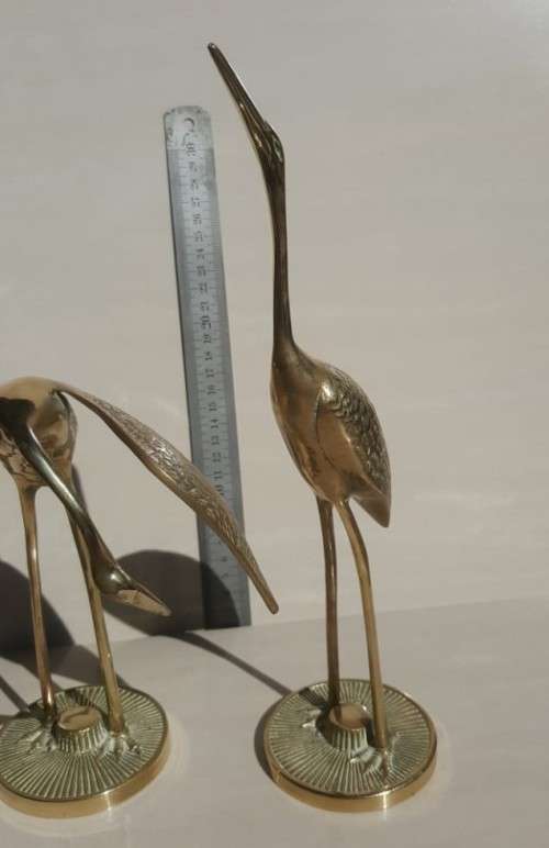ENDEARING VINTAGE PAIR OF BRASS COURTING CRANES
