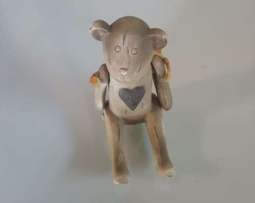 VERY CUTE SMALL WOODEN TEDDY BEAR WITH MOVABLE ARMS AND A BIG HEART