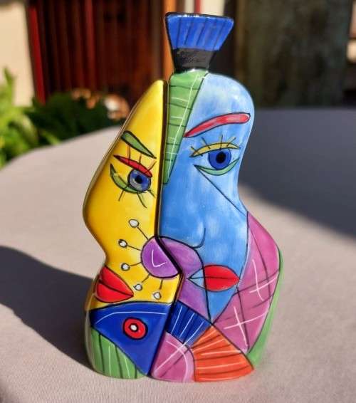 VERY CUTE HUGGING HIM AND HER SALT AND PEPPER SHAKERS WITH BRIGHT AFRICAN COLOURS