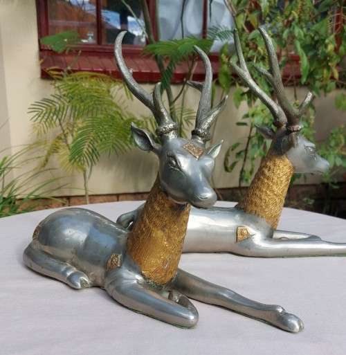 RARE SET OF 2 VINTAGE PEWTER AND BRASS RECLINING STAG REINDEER BOOKENDS