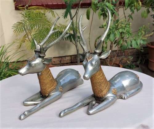 RARE SET OF 2 VINTAGE PEWTER AND BRASS RECLINING STAG REINDEER BOOKENDS