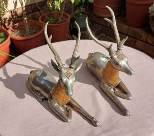 RARE SET OF 2 VINTAGE PEWTER AND BRASS RECLINING STAG REINDEER BOOKENDS