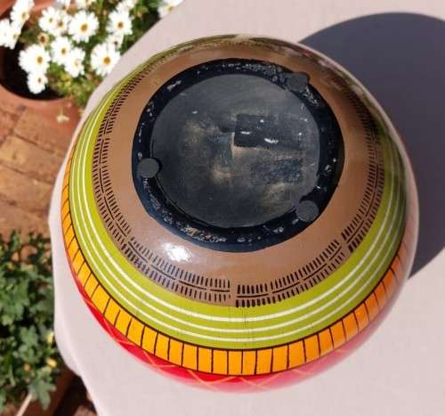 A LARGE COLOURFULL ETHNIC TRIBAL BELLY CERAMIC BASE