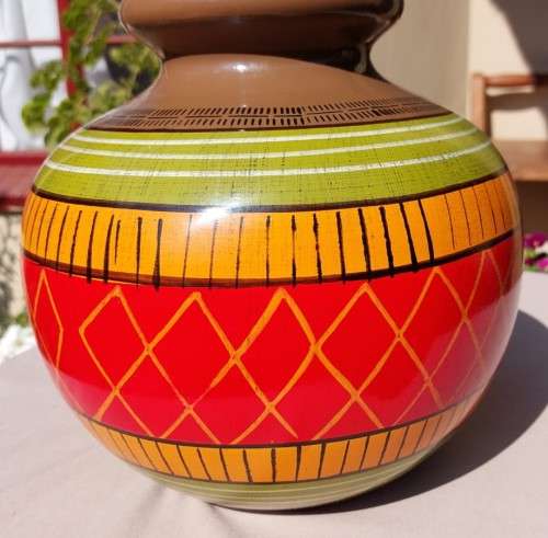 A LARGE COLOURFULL ETHNIC TRIBAL BELLY CERAMIC BASE