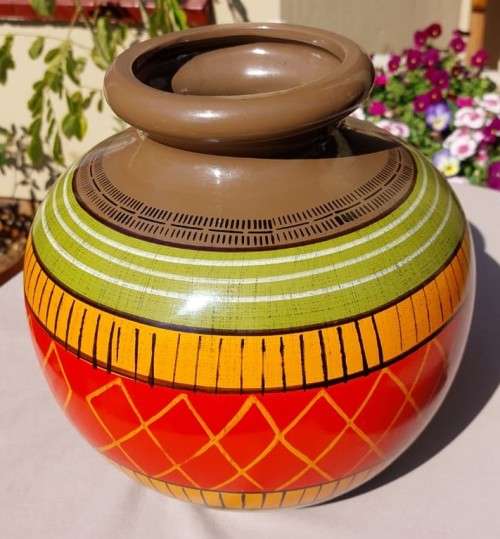 A LARGE COLOURFULL ETHNIC TRIBAL BELLY CERAMIC BASE