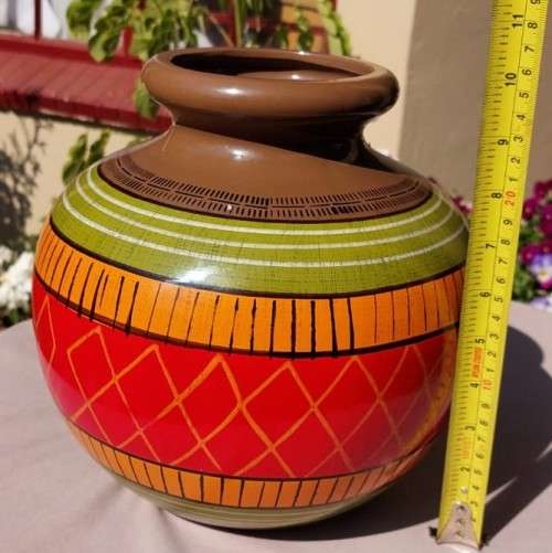 A LARGE COLOURFULL ETHNIC TRIBAL BELLY CERAMIC BASE