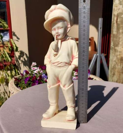 SIGNED ARTA FINA LARGE (31CM HIGH) RESIN STATUE OF YOUNG BOY SMOKING PIPE