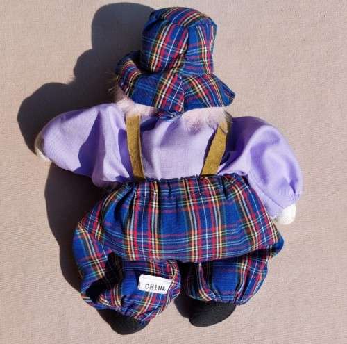 CREEPY CLOWN DOLL WITH PLASTIC FACE AND SAWDUST FILLED BODY