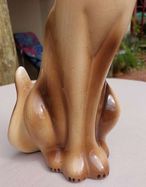 A CUTE 35CM HIGH CERAMIC SIAMESE CAT