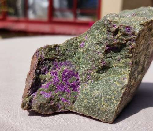 PURPLE ROCK SAMPLE OF RARE SUGILITE OR VERY RARE PURPURITE IN MANGANESE GREEN GRAY SLATE ORE