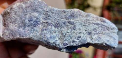 INCREDIBLY BEAUTIFUL RAW ROCK SPECIMEN IN SHADES OF PINK TO DARK PURPLE ON A WHITE QUARTZ OR PECTOLI