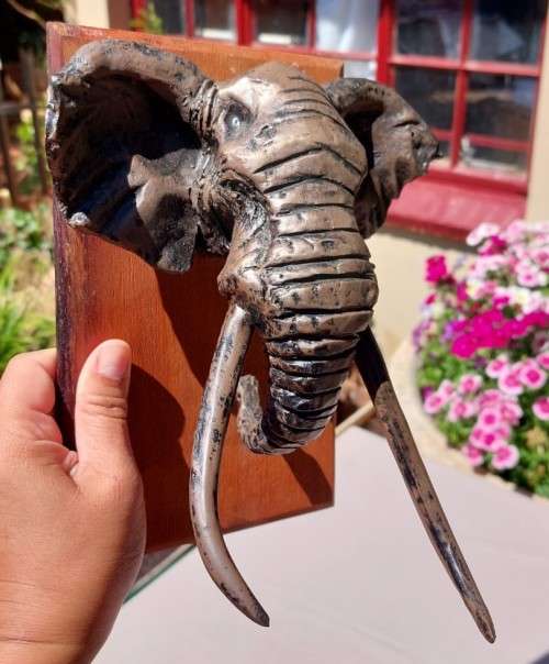 AFRICAN BULL ELEPHANT HENKMAM CLAY SCULPTURE WITH BRONZE COATING ON WOODEN WALL MOUNT