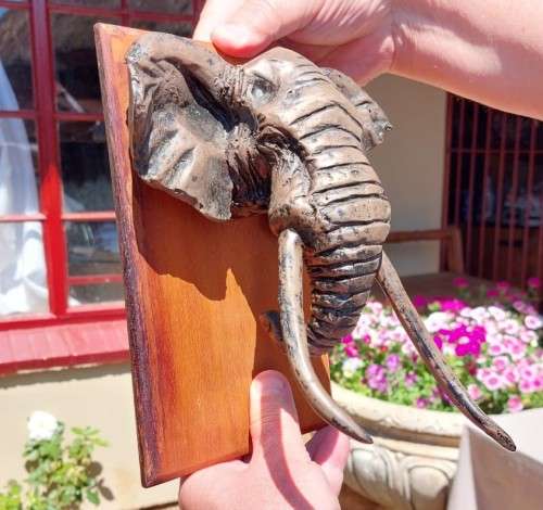 AFRICAN BULL ELEPHANT HENKMAM CLAY SCULPTURE WITH BRONZE COATING ON WOODEN WALL MOUNT