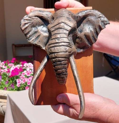 AFRICAN BULL ELEPHANT HENKMAM CLAY SCULPTURE WITH BRONZE COATING ON WOODEN WALL MOUNT