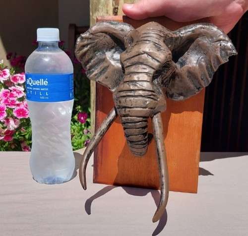 AFRICAN BULL ELEPHANT HENKMAM CLAY SCULPTURE WITH BRONZE COATING ON WOODEN WALL MOUNT