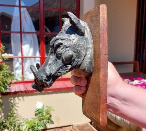 WARTHOG HENKMAM CLAY SCULPTURE WITH BRONZE COATING ON WOODEN WALL MOUNT