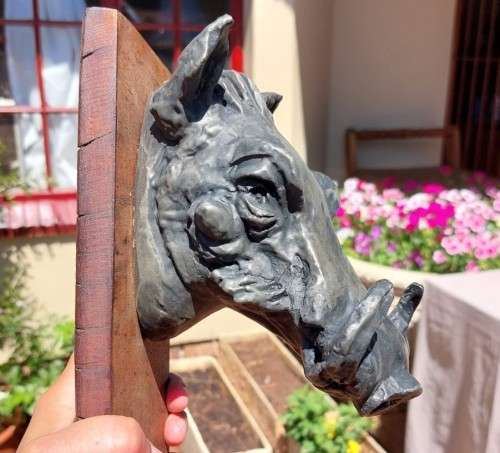 WARTHOG HENKMAM CLAY SCULPTURE WITH BRONZE COATING ON WOODEN WALL MOUNT