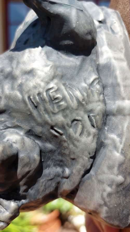 WARTHOG HENKMAM CLAY SCULPTURE WITH BRONZE COATING ON WOODEN WALL MOUNT