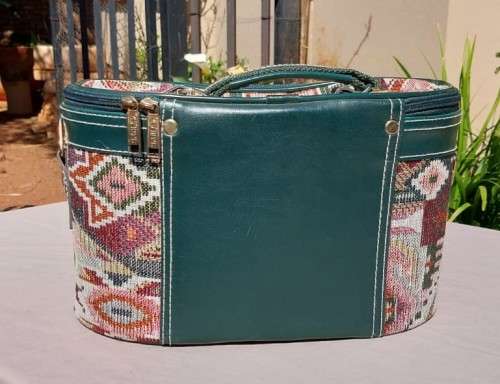 BEAUTIFUL SAFARI BRAND FABRIC STITCHED, FAUX LEATHER AND CANVAS HANDLE OVAL VANITY CASE