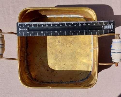 1940S BRASS AND METAL PLANTER WITH DELFT CERAMIC HANDLES AND CLAW FEET