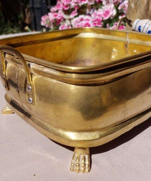 1940S BRASS AND METAL PLANTER WITH DELFT CERAMIC HANDLES AND CLAW FEET