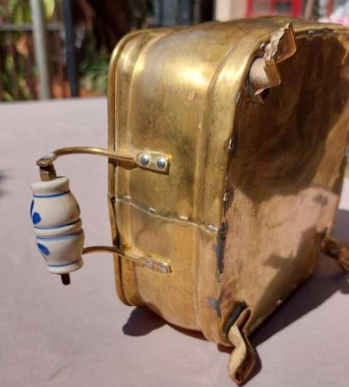 1940S BRASS AND METAL PLANTER WITH DELFT CERAMIC HANDLES AND CLAW FEET