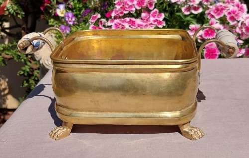 1940S BRASS AND METAL PLANTER WITH DELFT CERAMIC HANDLES AND CLAW FEET