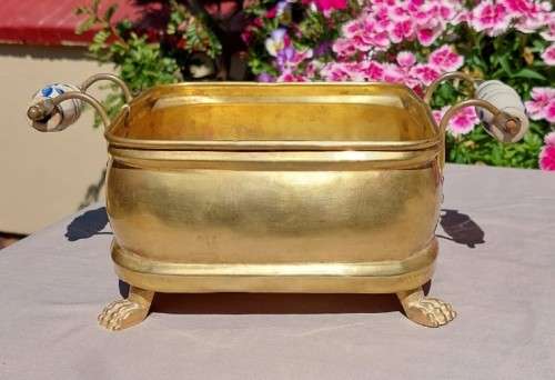 1940S BRASS AND METAL PLANTER WITH DELFT CERAMIC HANDLES AND CLAW FEET