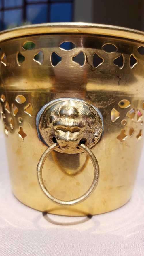 BRASS PLANTER WITH LION HANDLES AND A NICE GEOMETRIC CUTOUT DESIGN - SMALL (13CM DIAMETER 10CM HIGH)