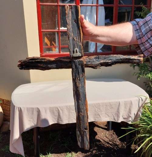 HANDMADE WOODEN CROSS DECORATED WITH NAILS AND VARNISH COATED