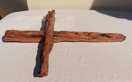 HANDMADE WOODEN CROSS DECORATED WITH NAILS AND VARNISH COATED