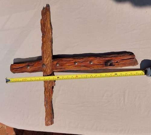 HANDMADE WOODEN CROSS DECORATED WITH NAILS AND VARNISH COATED