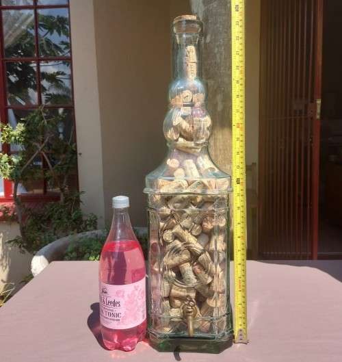 STUNNING GLASS TOWER WITH BRASS TAP 60CM HIGH FILLED WITH WINE CORKS  HANDMADE IN SPAIN BY LA MEDIT