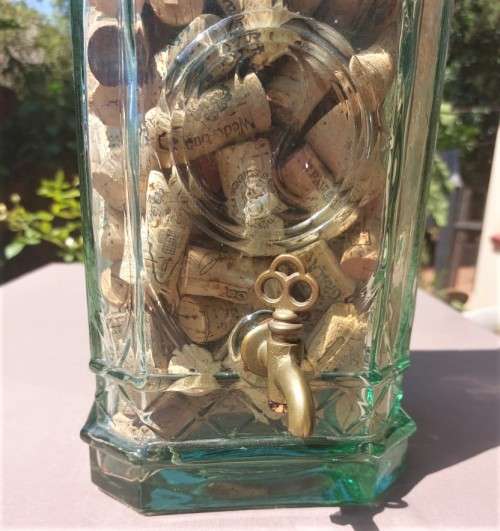 STUNNING GLASS TOWER WITH BRASS TAP 60CM HIGH FILLED WITH WINE CORKS  HANDMADE IN SPAIN BY LA MEDIT