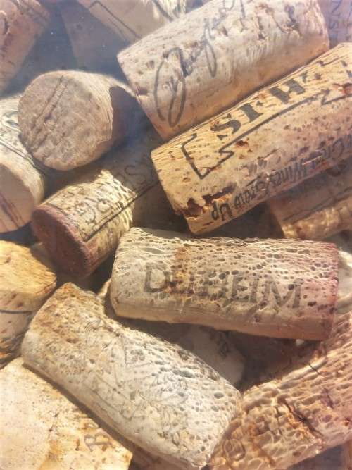 STUNNING GLASS TOWER WITH BRASS TAP 60CM HIGH FILLED WITH WINE CORKS  HANDMADE IN SPAIN BY LA MEDIT