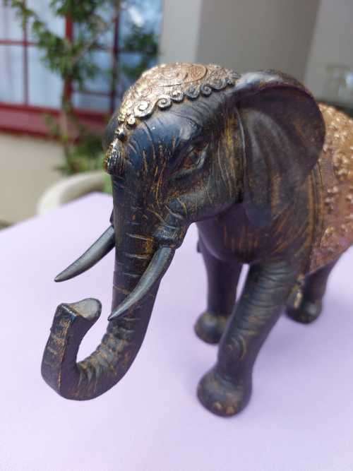 LUXURIOUS HANDMADE GOOD LUCK FENG SHUI RESIN STATUE OF A ROYAL ELEPHANT STRIDING FORWARD