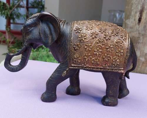 LUXURIOUS HANDMADE GOOD LUCK FENG SHUI RESIN STATUE OF A ROYAL ELEPHANT STRIDING FORWARD