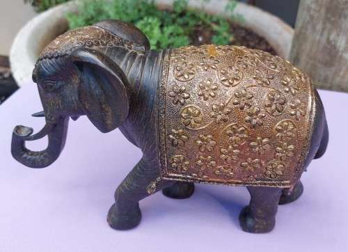 LUXURIOUS HANDMADE GOOD LUCK FENG SHUI RESIN STATUE OF A ROYAL ELEPHANT STRIDING FORWARD